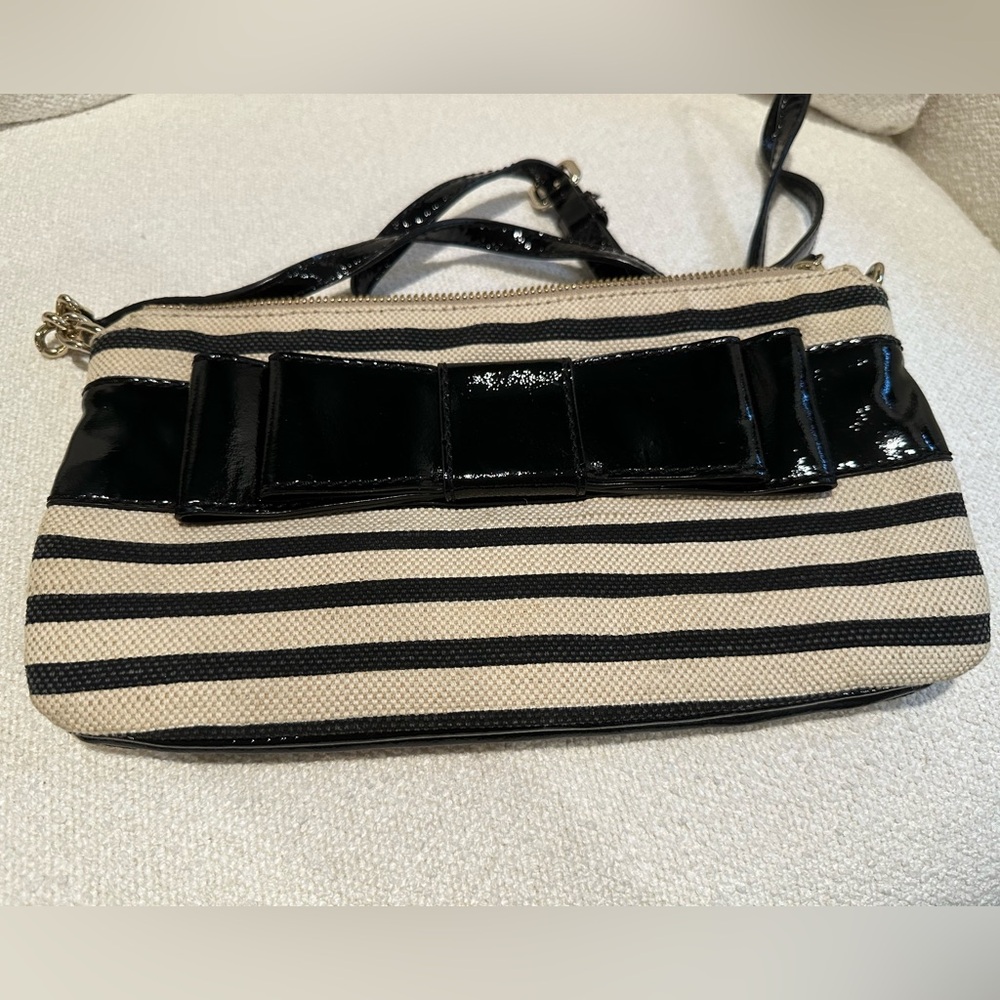 Kate Spade New York cream and black crossbody bag with black bow and purse bag
